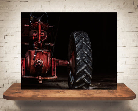 Red Tractor in Barn Photograph
